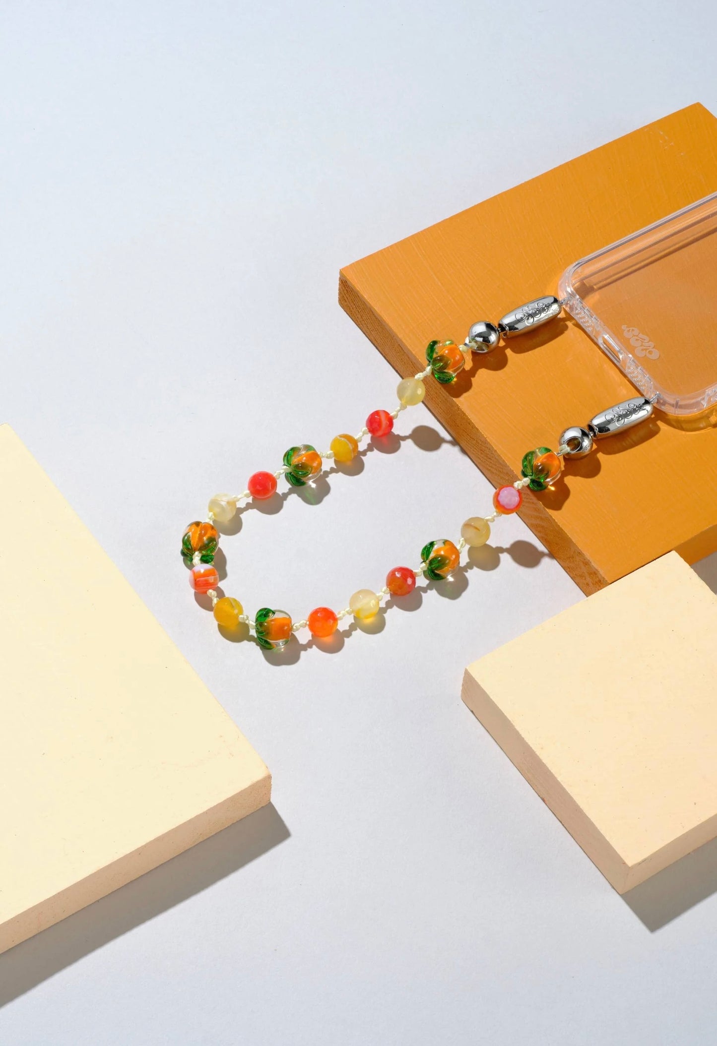 Ossa: Persimmon Gem Wristlet