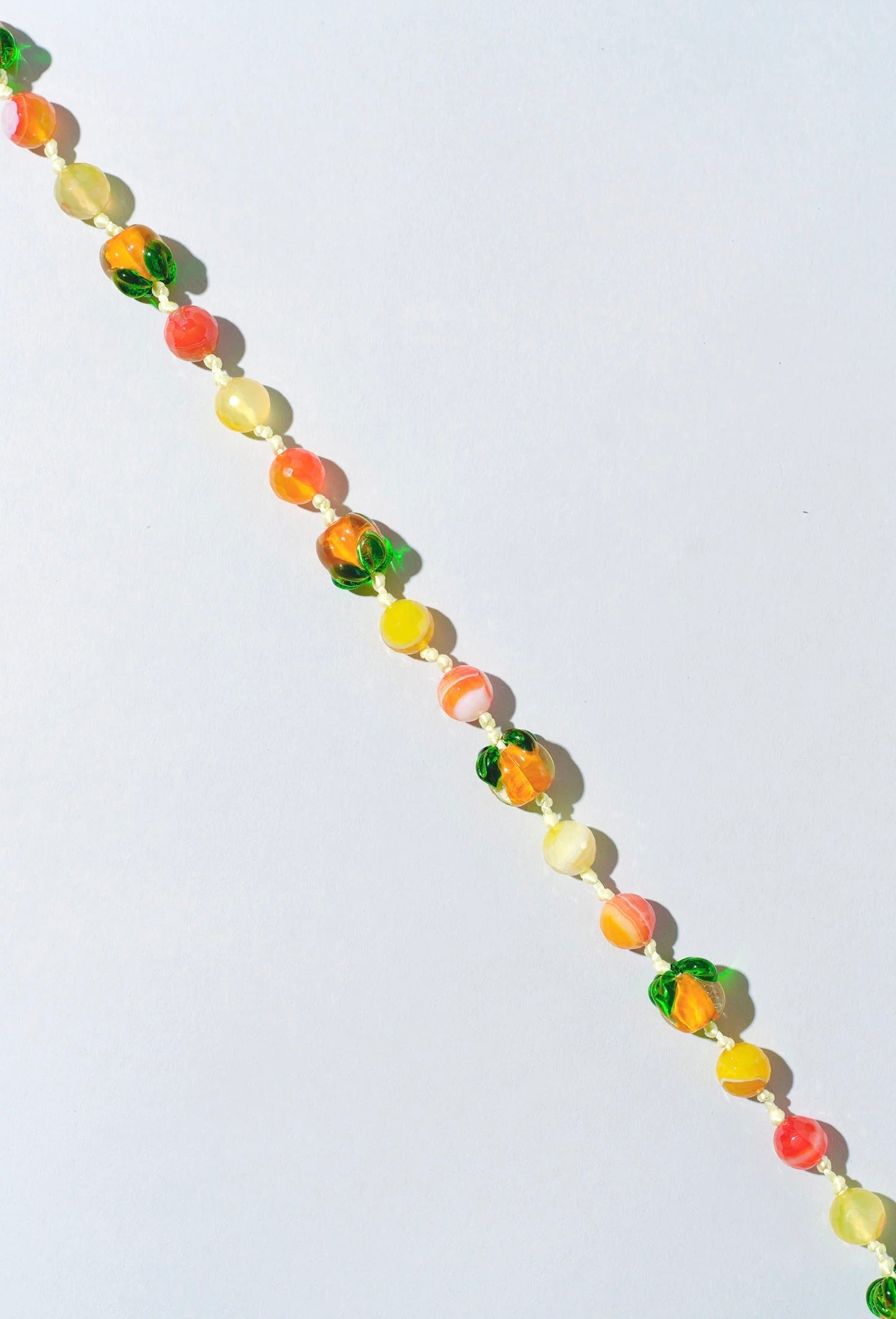 Ossa: Persimmon Gem Wristlet