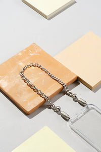 Ossa: Rhodium Mixed Metal Wristlet