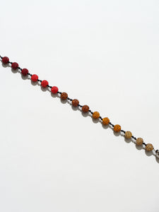 Ossa: Red Pave Disco Ball Wristlet
