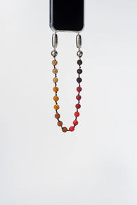 Ossa: Red Pave Disco Ball Wristlet