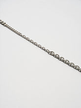Ossa: Rhodium Mixed Metal Wristlet