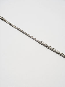 Ossa: Rhodium Mixed Metal Wristlet