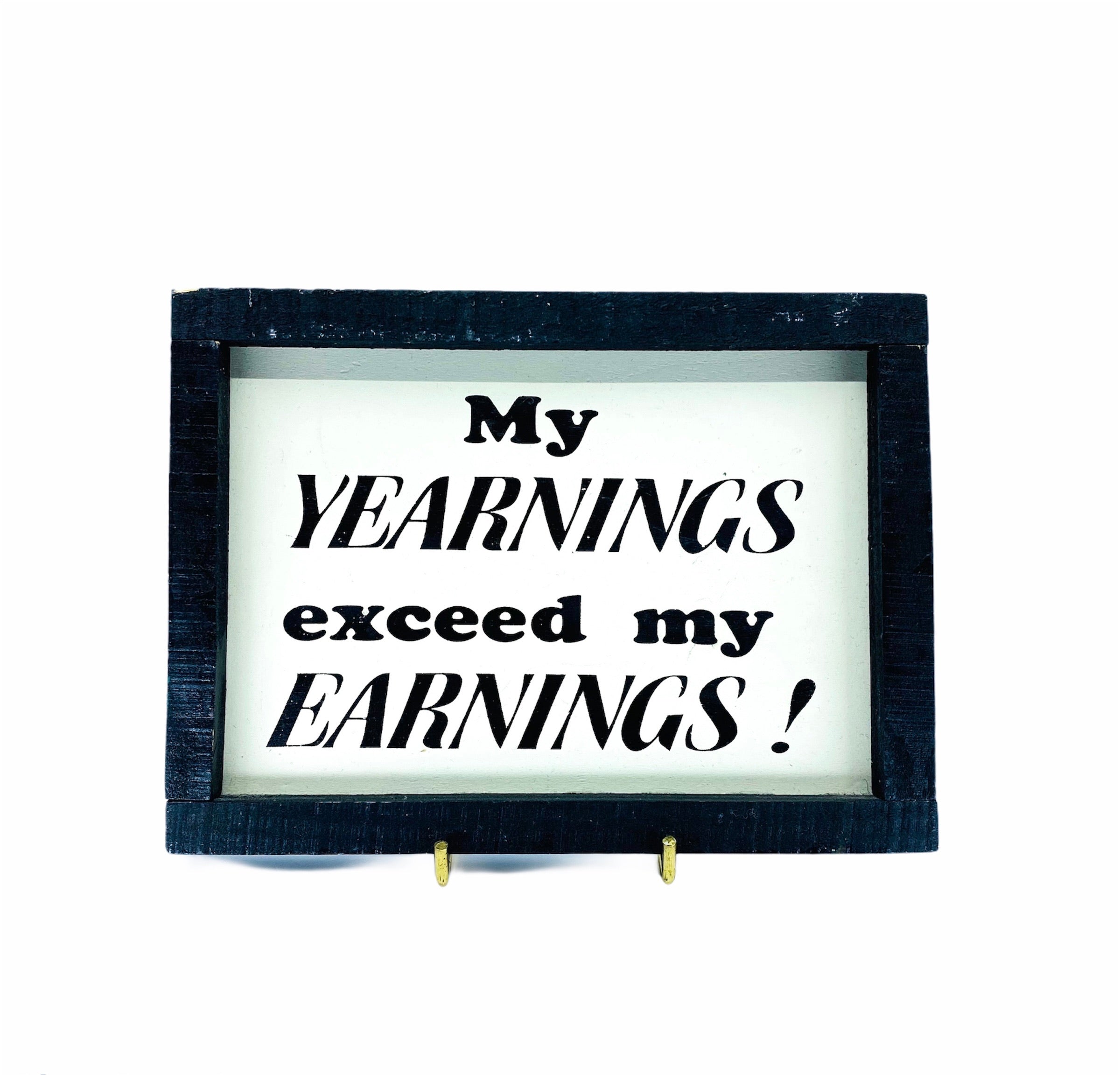 “My Yearnings Exceed My Earnings” Wall Plaque